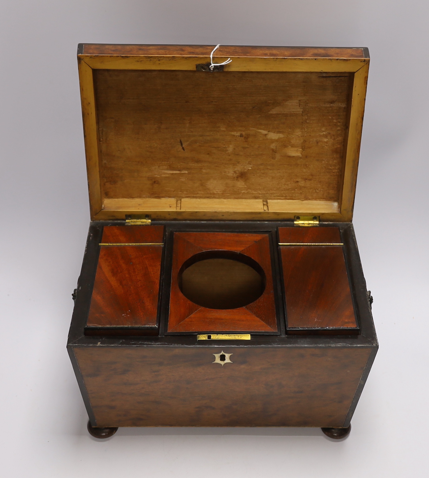 A late Regency plum-pudding mahogany tea caddy, missing glass mixing bowl, 23cm high CITES Submission reference VBFGW5JT